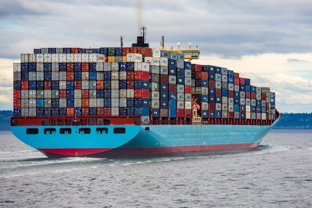Container ship departing China